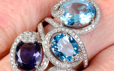 An 18ct gold amethyst, blue topaz and diamond dress ring.
