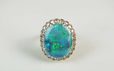 An 18ct gold black opal and diamond cluster ring