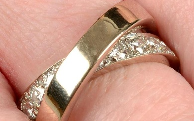 An 18ct gold diamond 'Nouvelle Vague' ring, by Cartier.Estimated total diamond weight 0.80ct, G-H