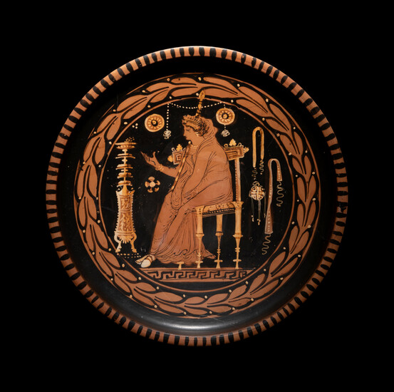 An Apulian Red-Figured Plate with a Seated Goddess or Priestess