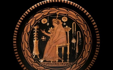 An Apulian Red-Figured Plate with a Seated Goddess or