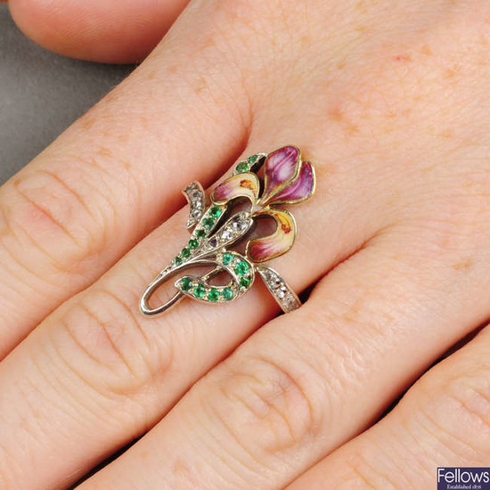 An Art Nouveau gold and silver, emerald, rose-cut diamond and enamel iris floral ring.