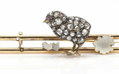 An Edwardian ruby, diamond and enamel hatching chick and shell brooch