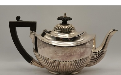 An Edwardian silver bachelor's teapot by Henry Clifford Davi...