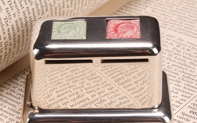 An Edwardian silver rounded rectangular stamp box, the hinge...