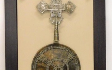 An Ethiopian shield, embellished in silver coloured metal with...