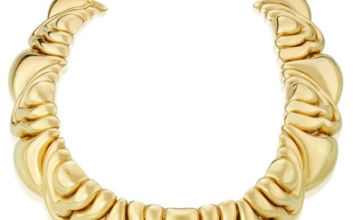 An eighteen karat gold collar necklace designed as wide...