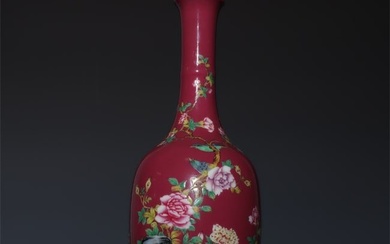 An exquisite carmine-red enamel vase