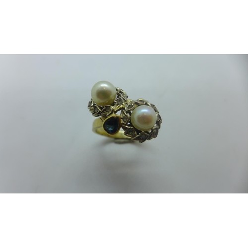 An unmarked yellow gold pearl ring, size O, approx 7 grams, ...