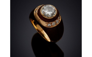 BOUCHERON Très belle bague jonc en or jaune 18 carats (750/000), bois d'amourette et diamants,...
