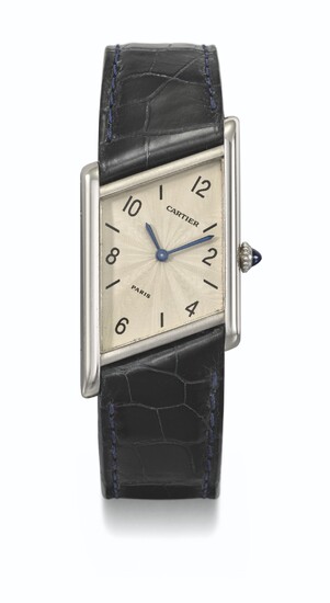CARTIER. A RARE AND UNUSUAL PLATINUM LIMITED EDITION ASYMMETRICAL WRISTWATCH