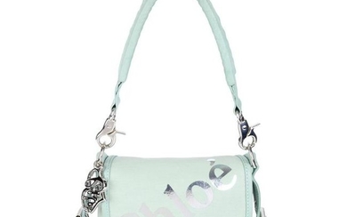 CHLOÉ - a pale green canvas flap handbag. Designed with