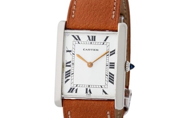 Cartier Paris. Fine and Charming Tank Automatic Wristwatch in White Gold, With Black Roman Numbers