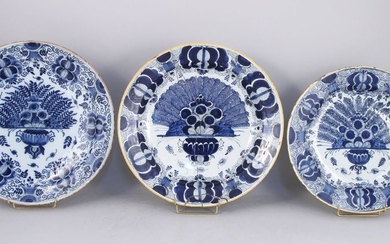 DELFT. Three round blue and white earthenware dishes...