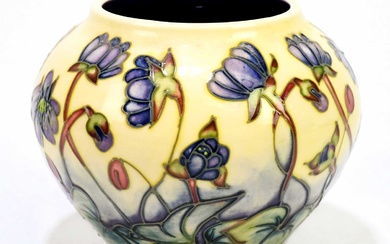 EMMA BOSSONS FOR MOORCROFT; a squat bowl decorated in the...