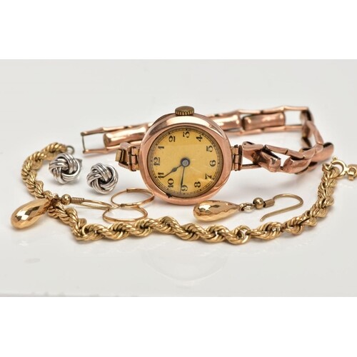 FIVE ITEMS OF JEWELLERY, to include a 1920's gold wrist watc...