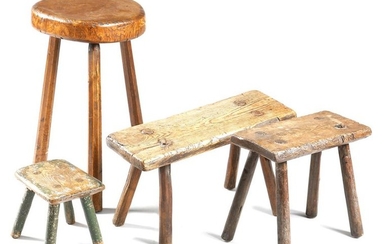 FOUR PRIMITIVE DAIRY STOOLS 19TH CENTURY AND LATER...