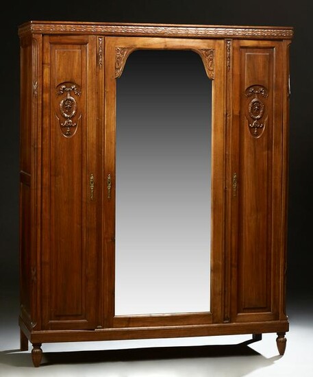 French Louis XVI Style Carved Walnut Armoire, c. 1900