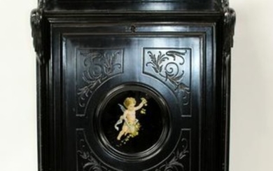 French Napoleon III ebonized cabinet with cherub
