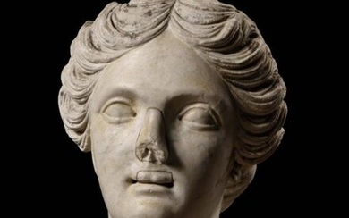 French School of the 17th century in the taste of Ancient Venus Head White marble H. 29 cm Accidents and old restorations to the nose and upper lip
