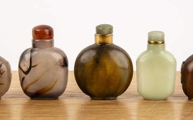Group of five snuff bottles Chinese including an agate bottle...