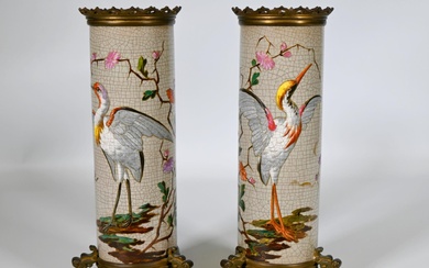 Longwy, 1872-1914, paire de vases "rouleau" en faïence émaillée à décor de hérons sur fond...