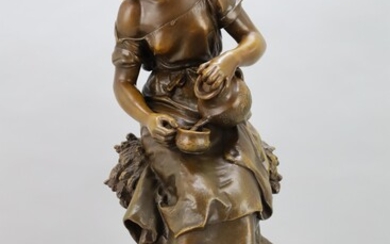MOREAU Math. Femme assise sur un foin avec une cruche à verser" sculpture en bronze...