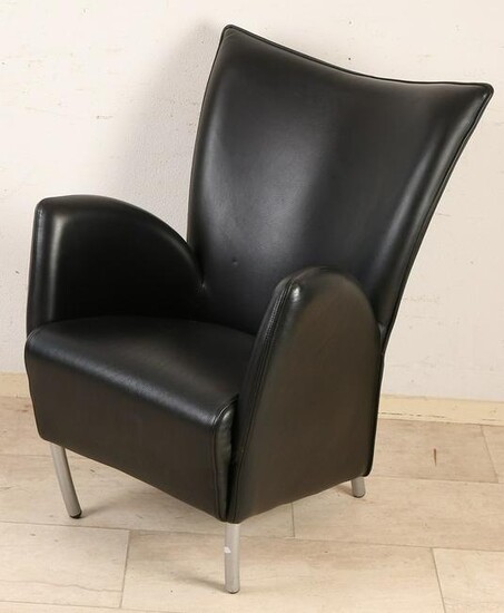 Modern leather armchair with aluminum legs.&#160