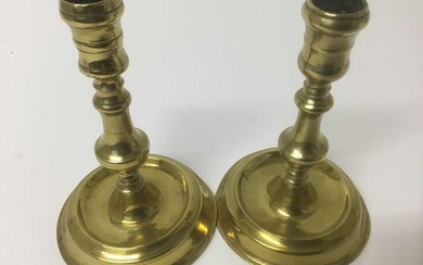 Near pair of early 18th century brass candlesticks