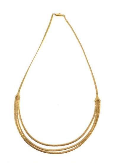 Necklace in 18 K (750 °/°°°) yellow gold with square and guilloché links, the neckline with three rows in the spirit of a drapery.