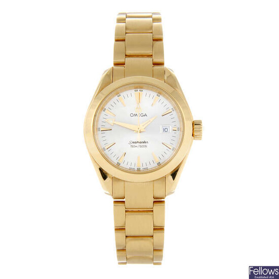 OMEGA - a lady's 18ct yellow gold Seamaster Aqua Terra bracelet watch.