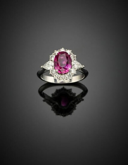 Oval ct. 2.75 ruby with pear and round diamond white