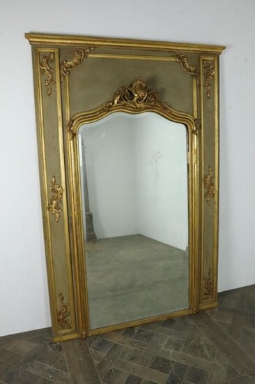Overmantel mirror in grey-green lacquered wood and gilded stucco.