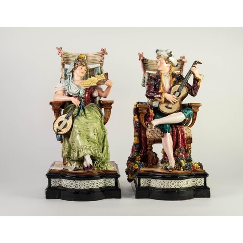 PAIR OF LATE NINETEENTH CENTURY CONTINENTAL FAIENCE FIGURE S...