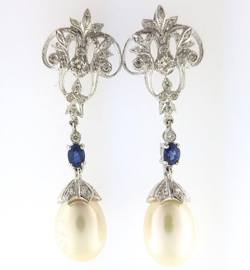 Pair of 750°/°°° white gold leafed earrings set with diamonds holding in pendants a sapphire adorned with a cultured pearl, L 4cm, Gross weight: 9g
