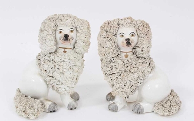 Pair of Staffordshire poodles