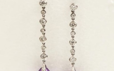 Pair of earrings in 18k white gold made...
