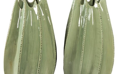 Pair of green enameled porcelain vases in the shape of