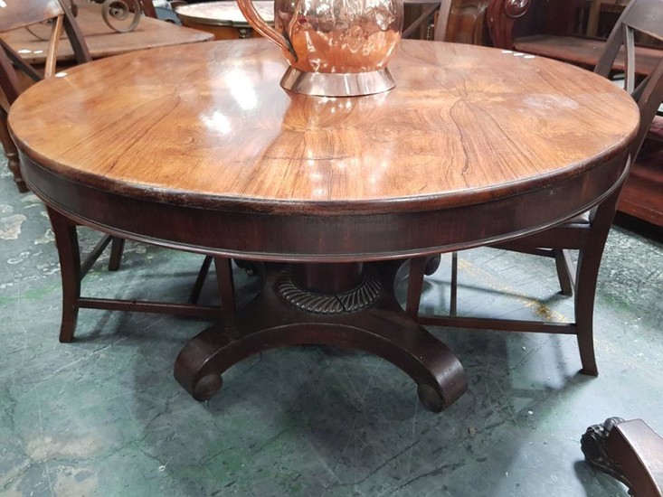 Regency Rosewood Tilt Top Supper Table, the round top on a turned pedestal with reeded collar & quadraform base