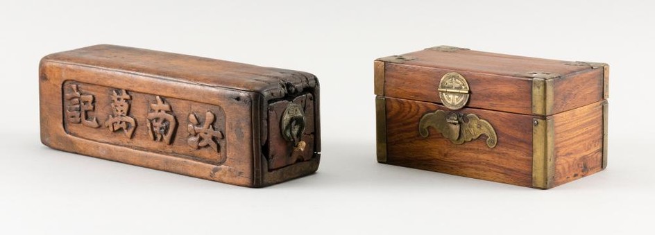 TWO CHINESE WOOD BOXES 1) Small lift-top box with brass mounts and bat-form lock plate (no key). Height 3". Width 5.25". Depth 3.25"...