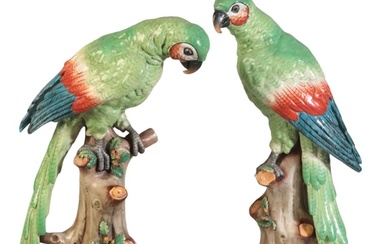 TWO SIMILAR PORCELAIN PARROTS bearing gold anchor marks tow...