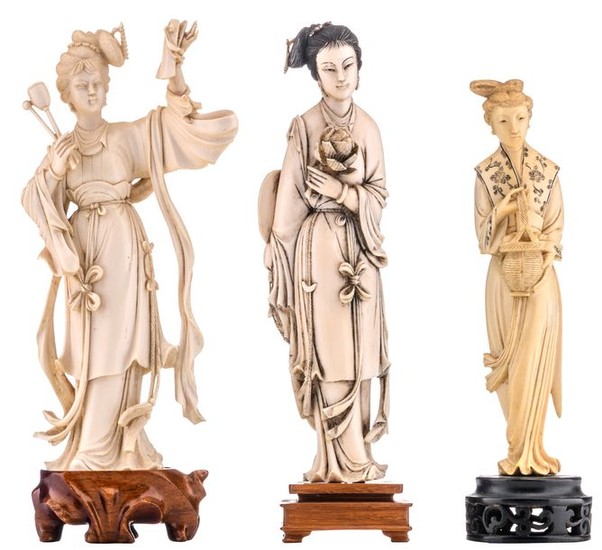 Three ivory Chinese beauties, two with carved and …