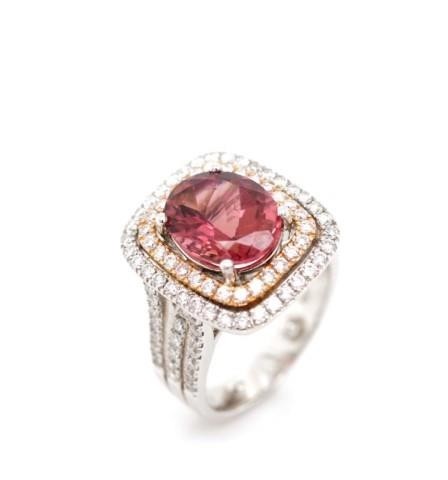 Tourmaline and diamond set 18ct gold halo ring by Hardy Bros...