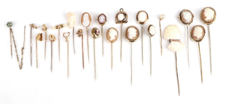 Twenty-Two Stick Pins, including thirteen cameo examples; pearl set examples...