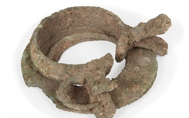 Two Chinese bronze bracelets, Neolithic period, now fused as one,...