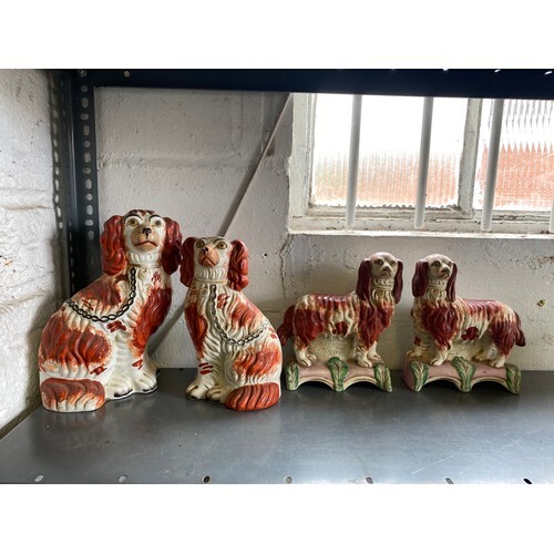 Two pair of Staffordshire mantel dogs