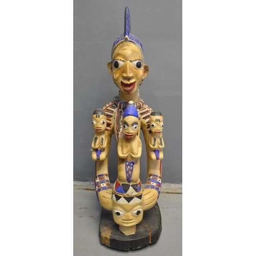 West African polychrome decorated offertory figure of a moth...