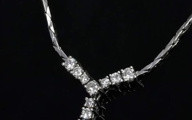 White gold 585 necklace with faceted sapphire (ca. 1.25ct) and diamond bands (add. ca. 0.65ct/SI/W), 8,5g, l. 44cm