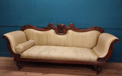 William IV carved mahogany and upholstered three seater sofa...