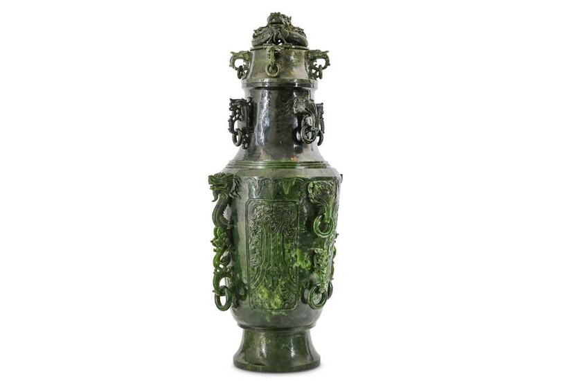 A MASSIVE CHINESE SPINACH JADE 'DRAGON' VASE AND COVER....